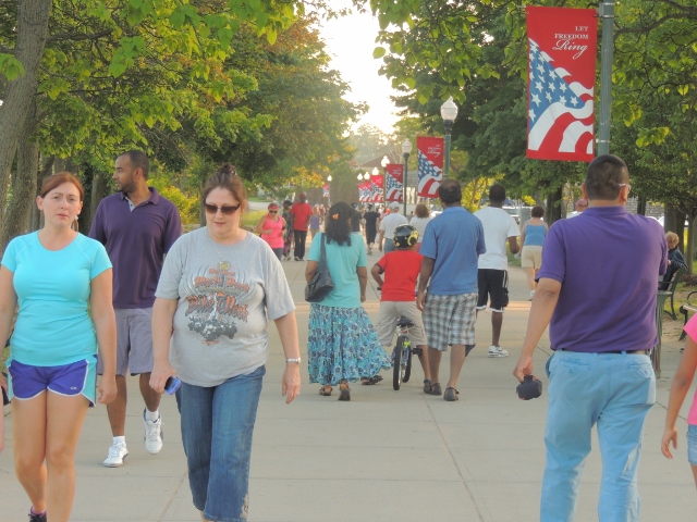 family friends walking on boardwalk,love pics