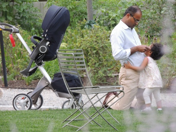 dad wiping child face, love display in pictures