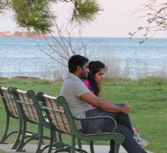 indian couple sitting together, america the gift